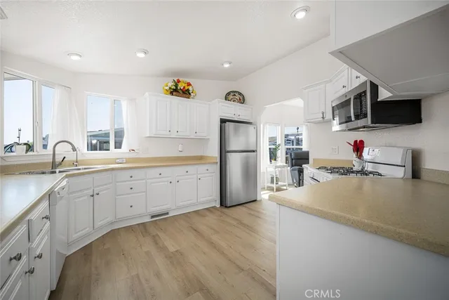 $244,900 | 16222 Monterey Lane, Unit 210, Huntington Beach, CA 92649