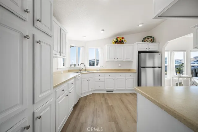 $244,900 | 16222 Monterey Lane, Unit 210, Huntington Beach, CA 92649