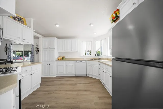 $244,900 | 16222 Monterey Lane, Unit 210, Huntington Beach, CA 92649