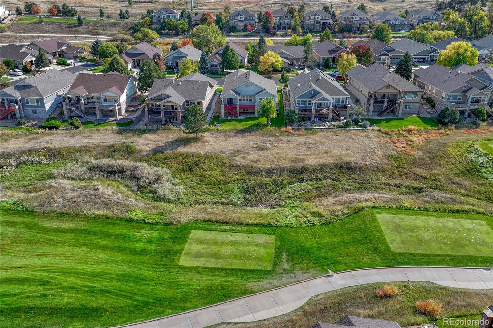 8107 South Catawba Court Aurora, CO 80016 - Photo 42 of 46 an aerial view of residential houses with outdoor space and trees