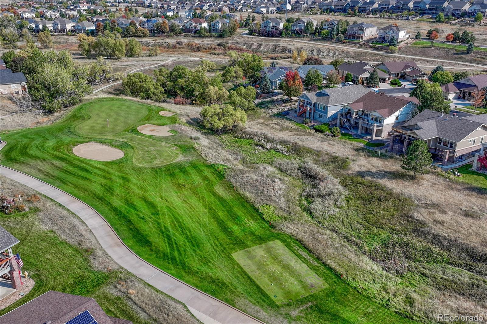 8107 South Catawba Court Aurora, CO 80016 - Photo 43 of 46 an aerial view of residential houses with outdoor space and street view