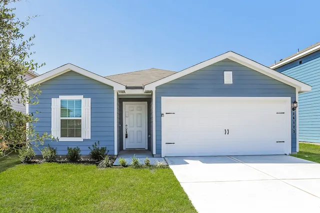 a front view of house with yard