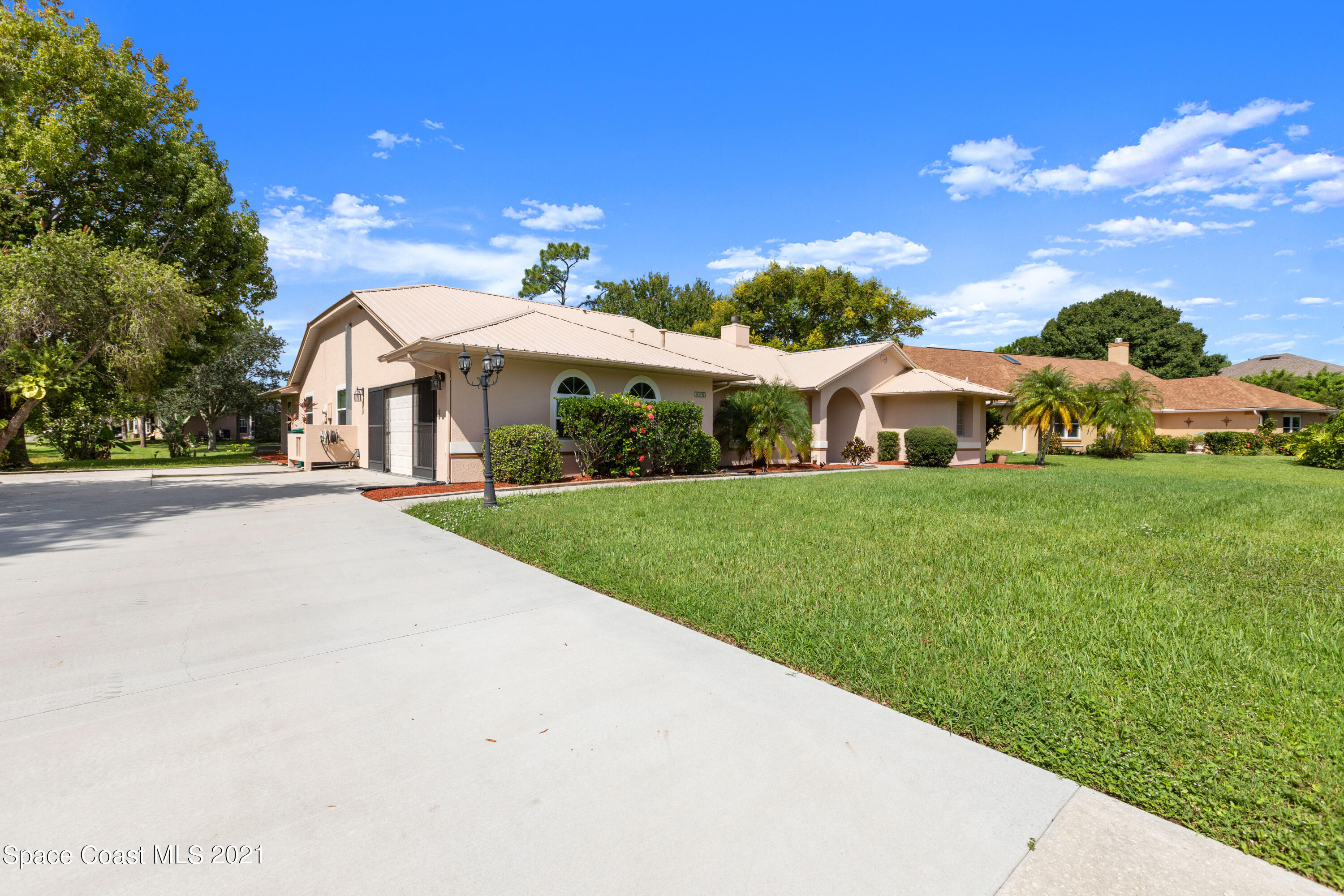 3550 Big Pine Road Melbourne, FL 32934 - Photo 3 of 38 Front of home