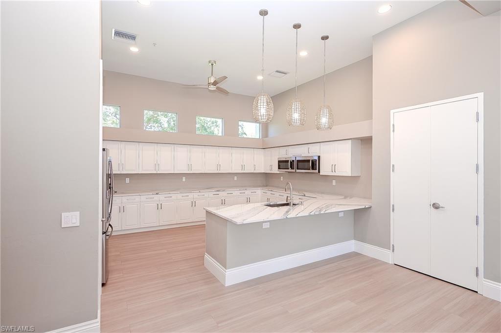 3303 Twilight Lane, Unit 5101 Naples, FL 34109 - Photo 43 of 49 Newly Renovated Clubhouse Kitchen