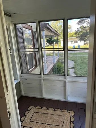 a view of an empty room and window