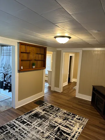 a kitchen with a refrigerator and a stove