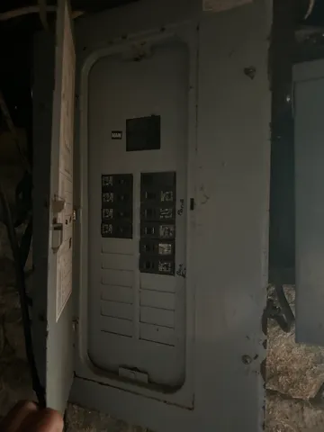 a view of fireplace and living room