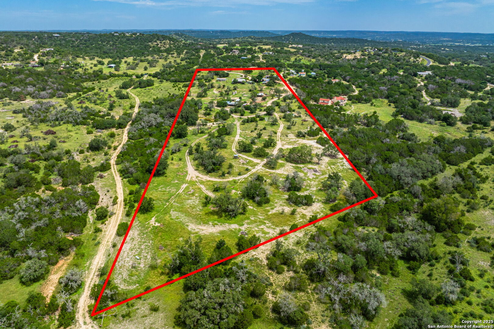943 Stoneleigh Road Center Point, TX 78010 - Photo 35 of 36 a view of a lush green field