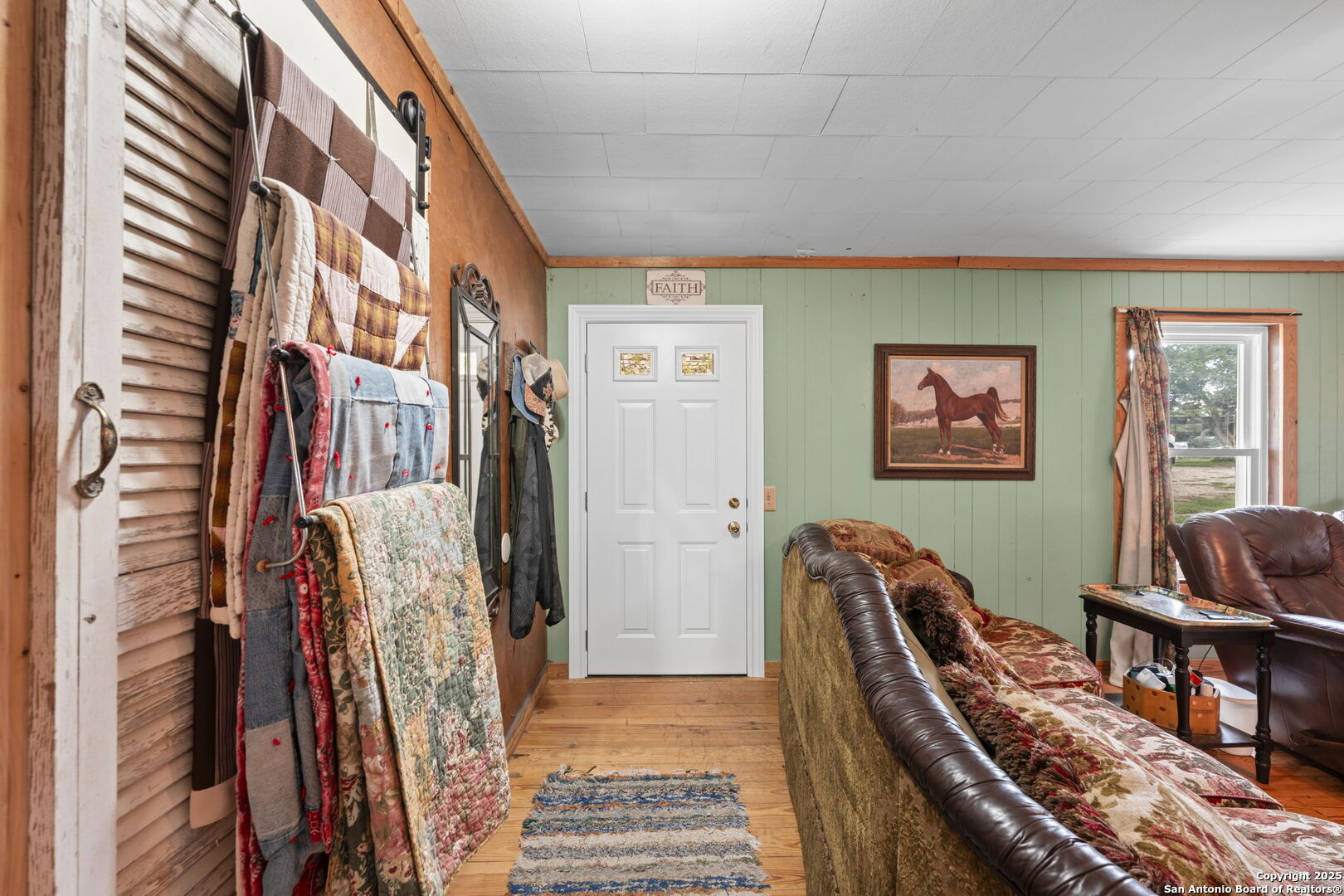 943 Stoneleigh Road Center Point, TX 78010 - Photo 5 of 36 a view of a livingroom with furniture and stairs