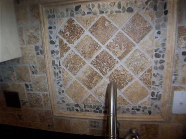 1303 River Ridge Drive Collierville, TN 38017 - Photo 4 of 12 Check out the detail in the tiled backsplash!
