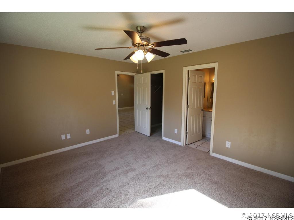 2007 Orange Tree Drive Edgewater, FL 32141 - Photo 11 of 23 a view of a livingroom with a ceiling fan