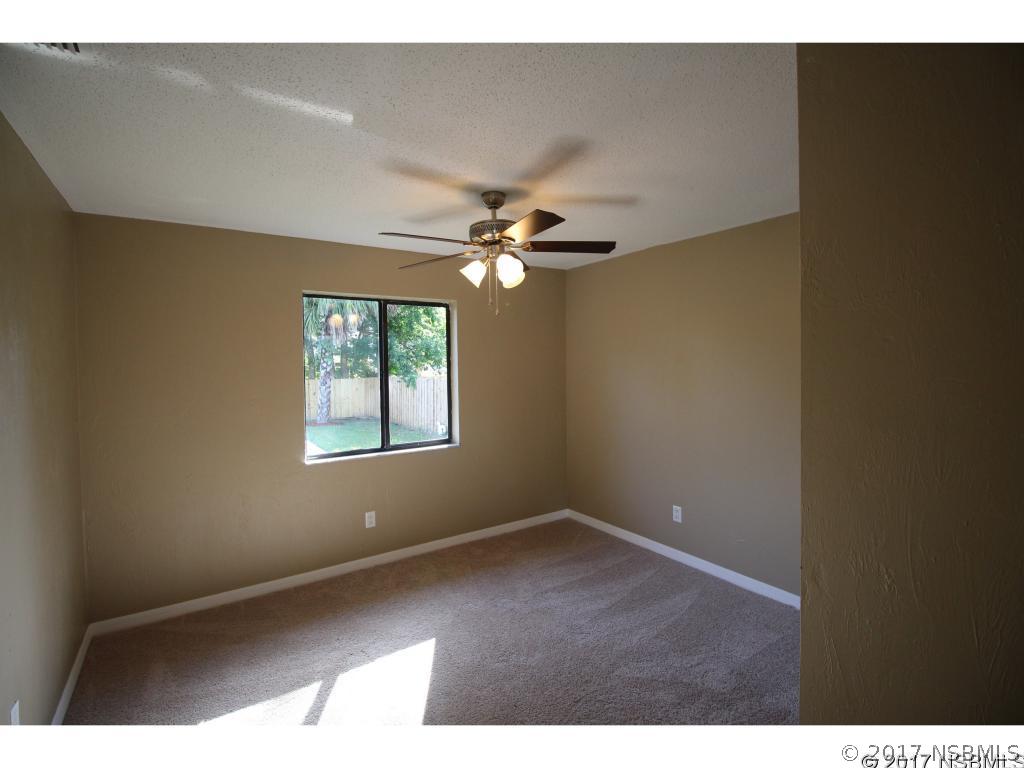 2007 Orange Tree Drive Edgewater, FL 32141 - Photo 13 of 23 a view of an empty room with a window