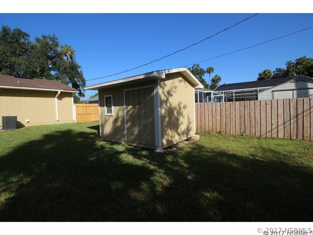 2007 Orange Tree Drive Edgewater, FL 32141 - Photo 19 of 23 a view of back yard of the house