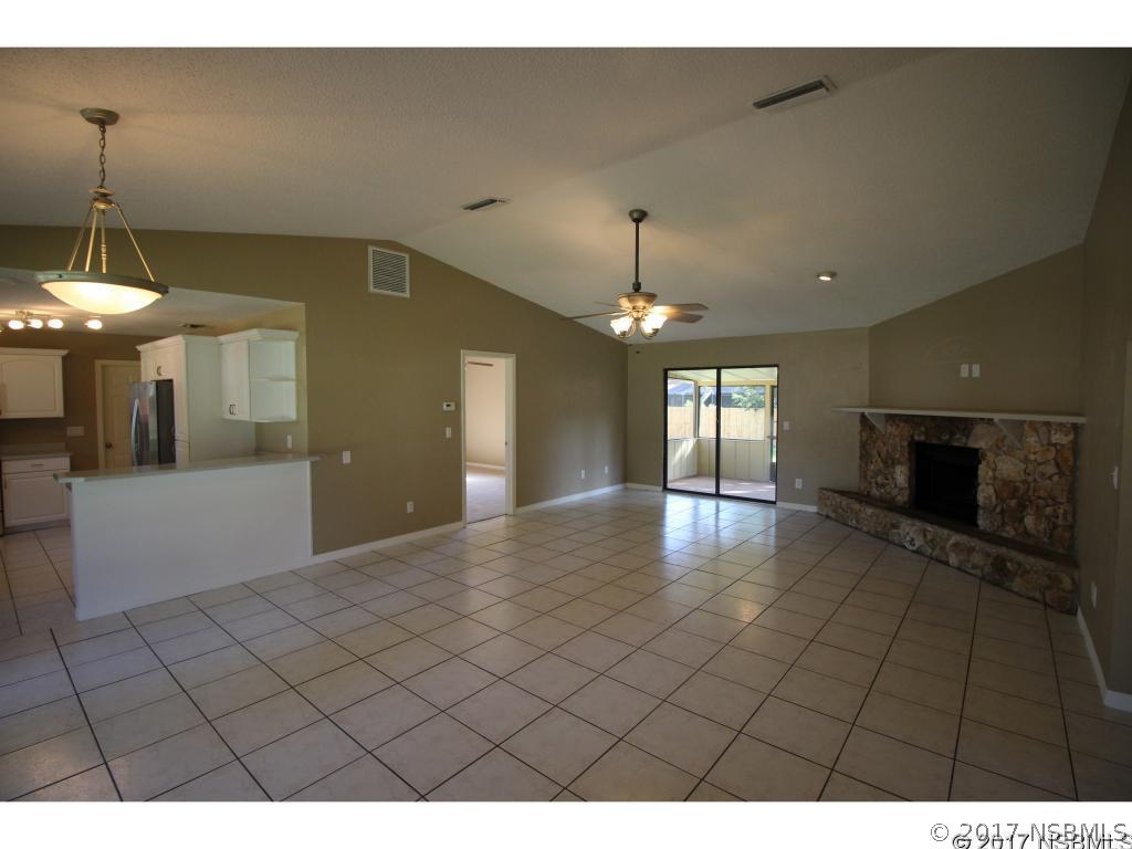 2007 Orange Tree Drive Edgewater, FL 32141 - Photo 4 of 23 a view interior of a house window and wooden floor