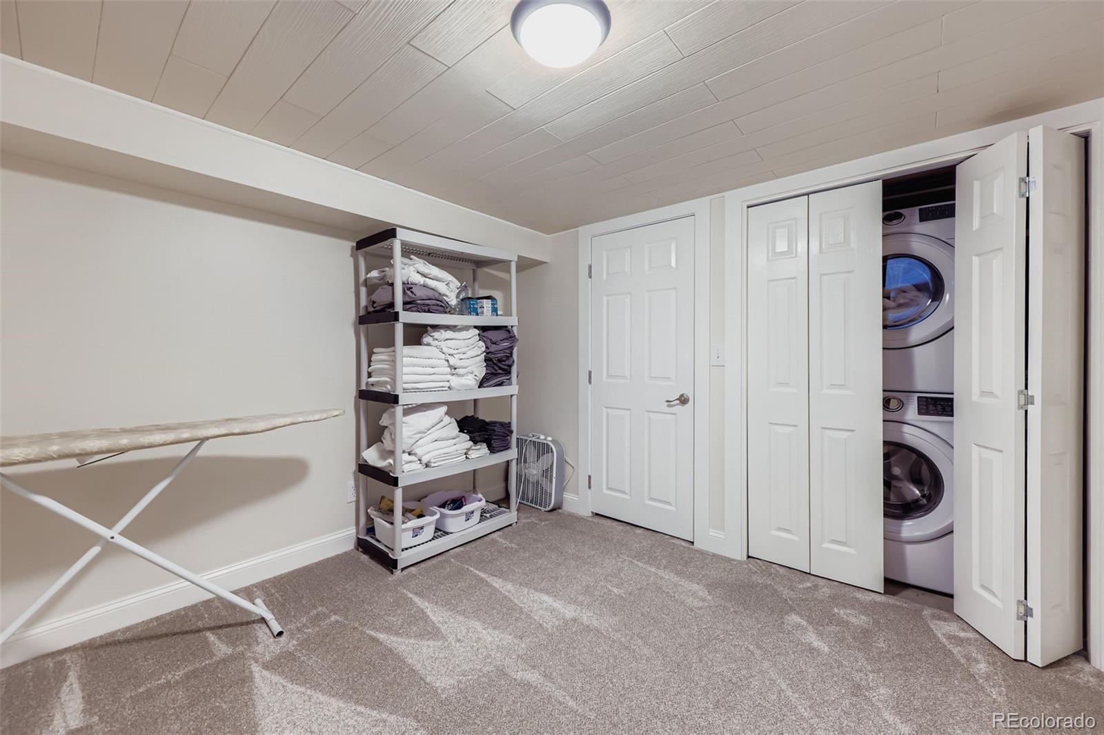 120 Gilbert Street Castle Rock, CO 80104 - Photo 19 of 25 a view of a room with shelves