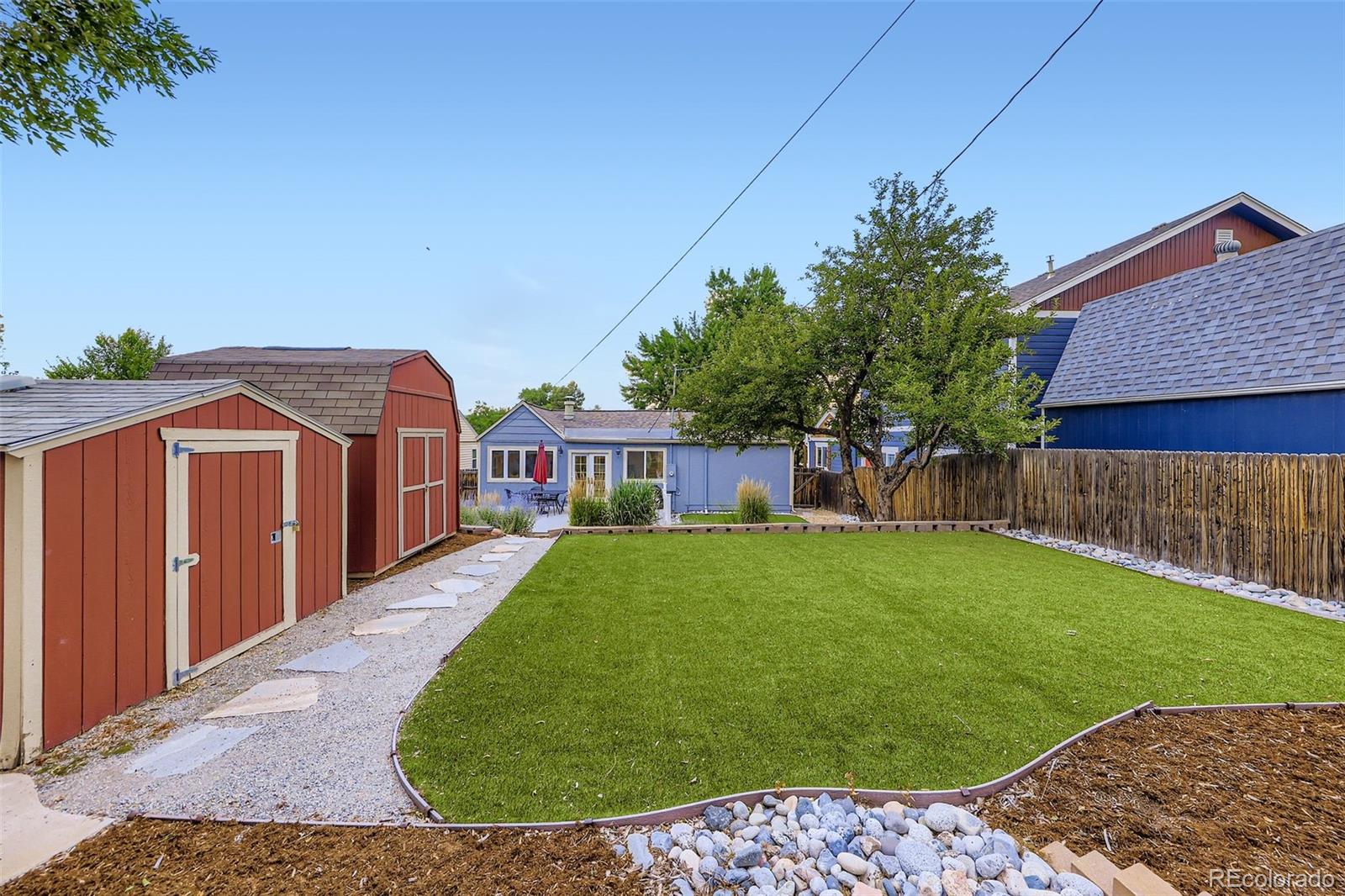 120 Gilbert Street Castle Rock, CO 80104 - Photo 23 of 25 a view of a back yard of the house