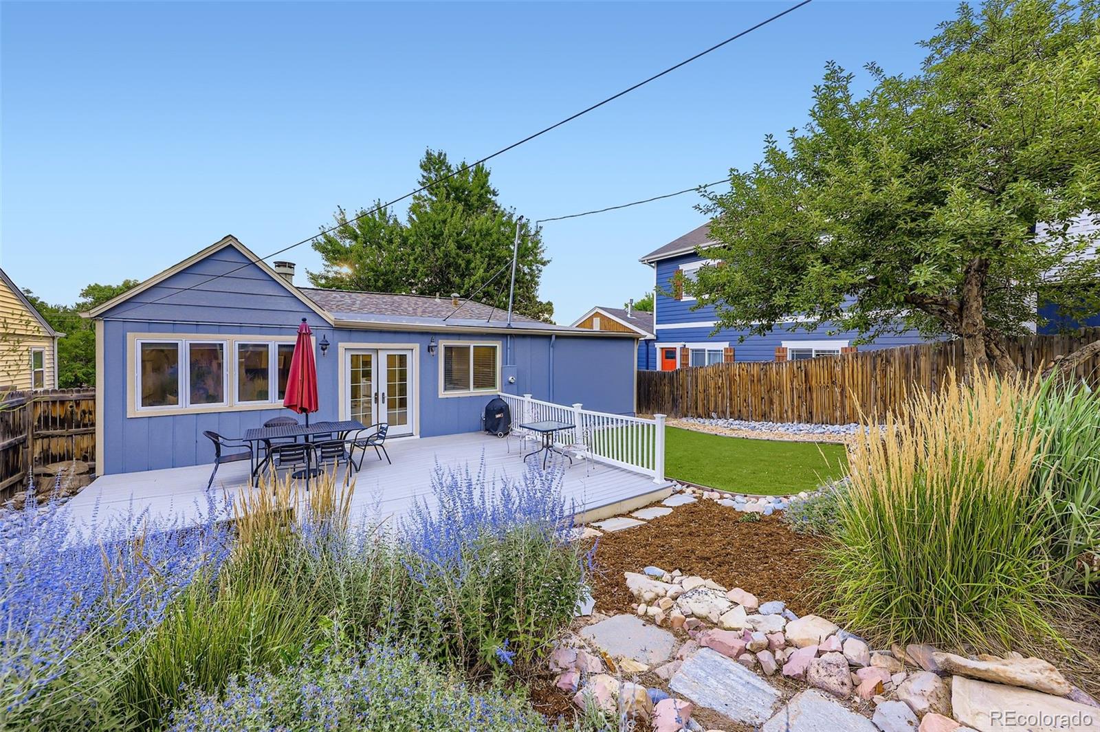 120 Gilbert Street Castle Rock, CO 80104 - Photo 24 of 25 a front view of house with yard and outdoor seating