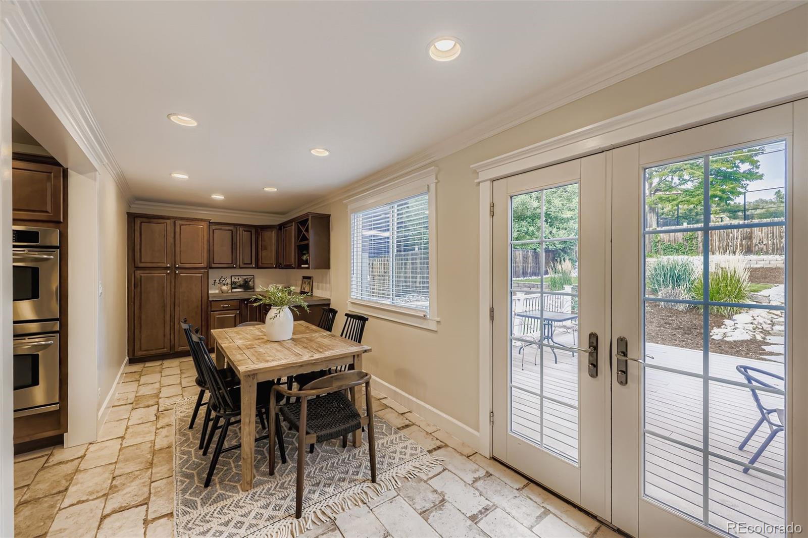 120 Gilbert Street Castle Rock, CO 80104 - Photo 6 of 25 a view of a dining room with furniture window and outside view