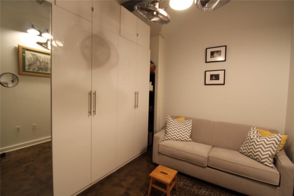 172 Haynes Street Southwest, Unit 208 Atlanta, GA 30313 - Photo 4 of 30 a living room with furniture