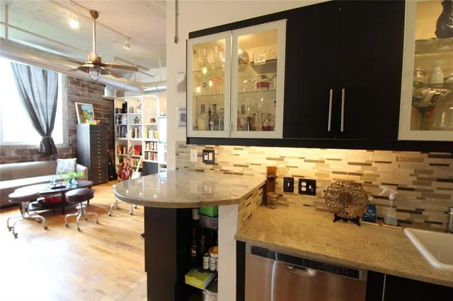 a bathroom with a sink and a large mirror