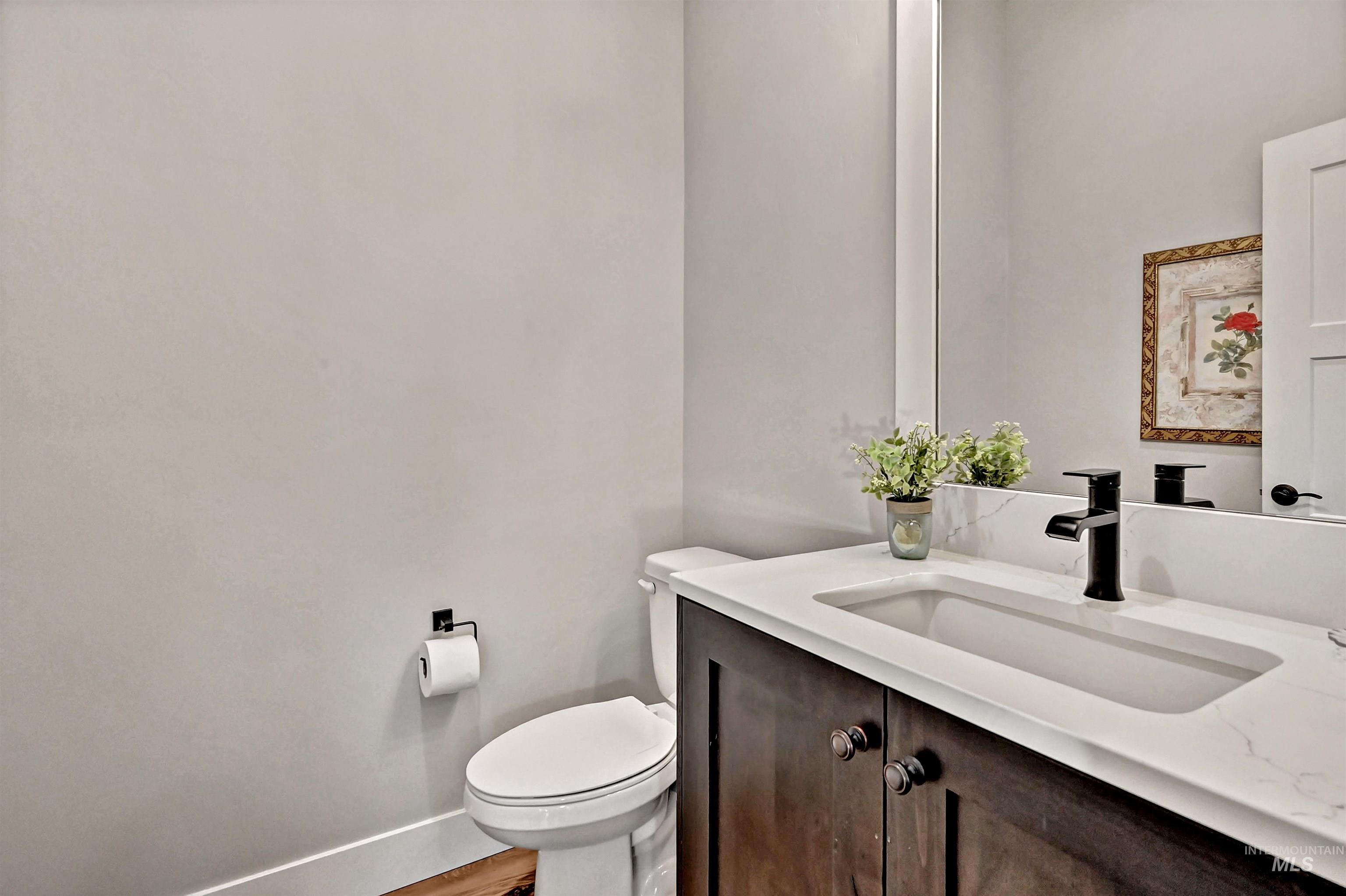 14964 Mortensen Court Caldwell, ID 83607 - Photo 19 of 38 Bathroom featuring vanity and toilet