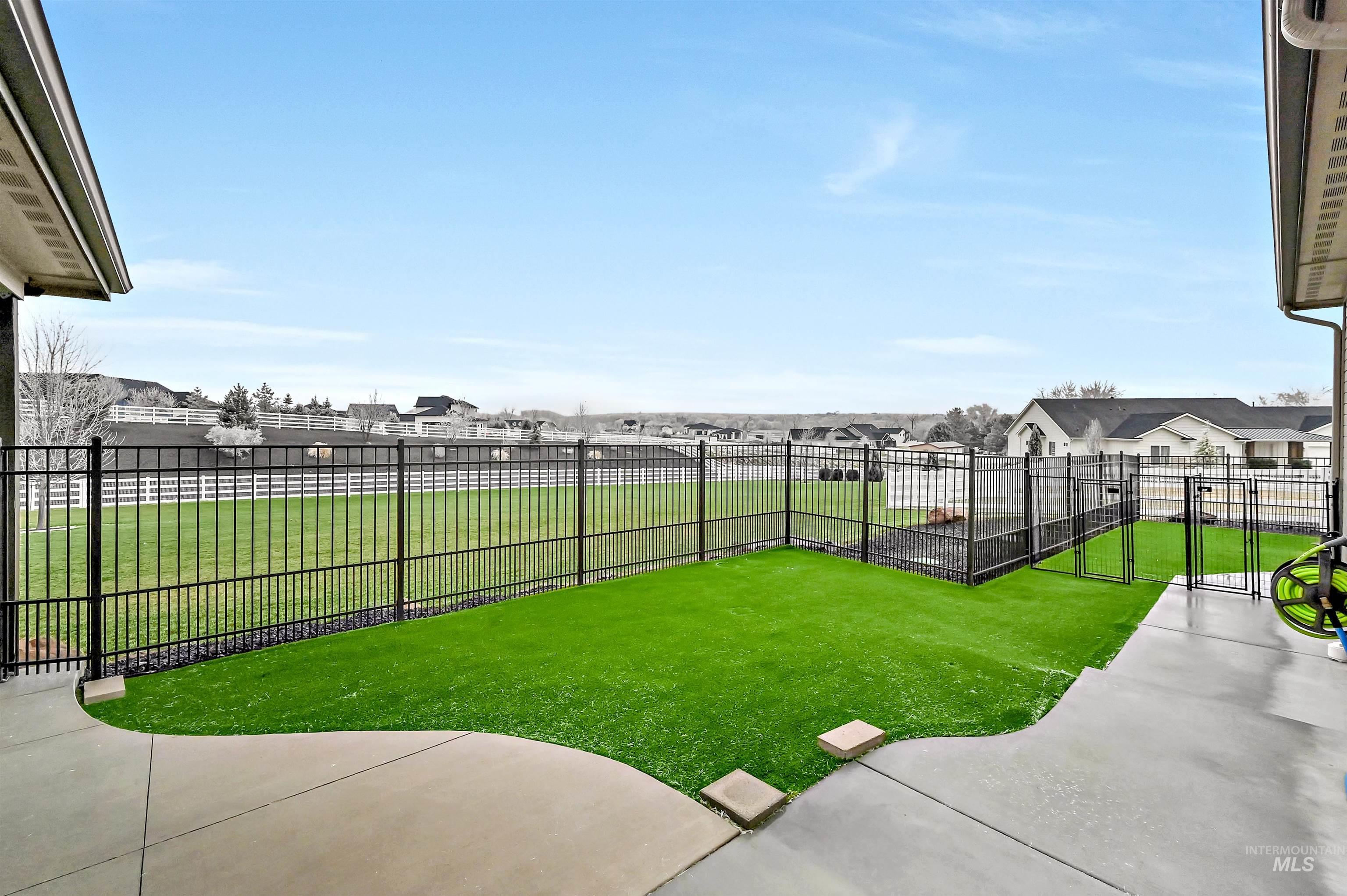 14964 Mortensen Court Caldwell, ID 83607 - Photo 34 of 38 View of yard with a patio area and a residential view