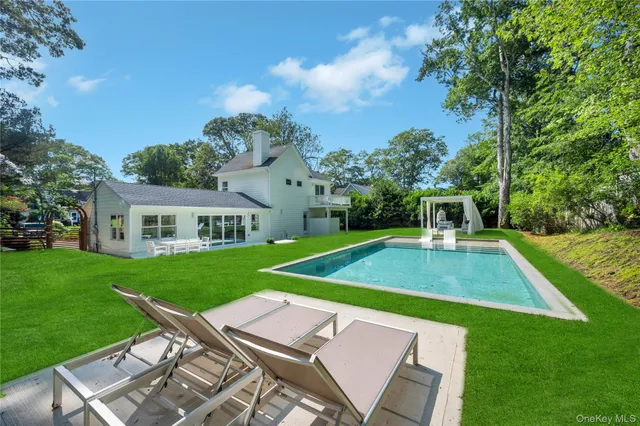 a view of a two chairs in the deck