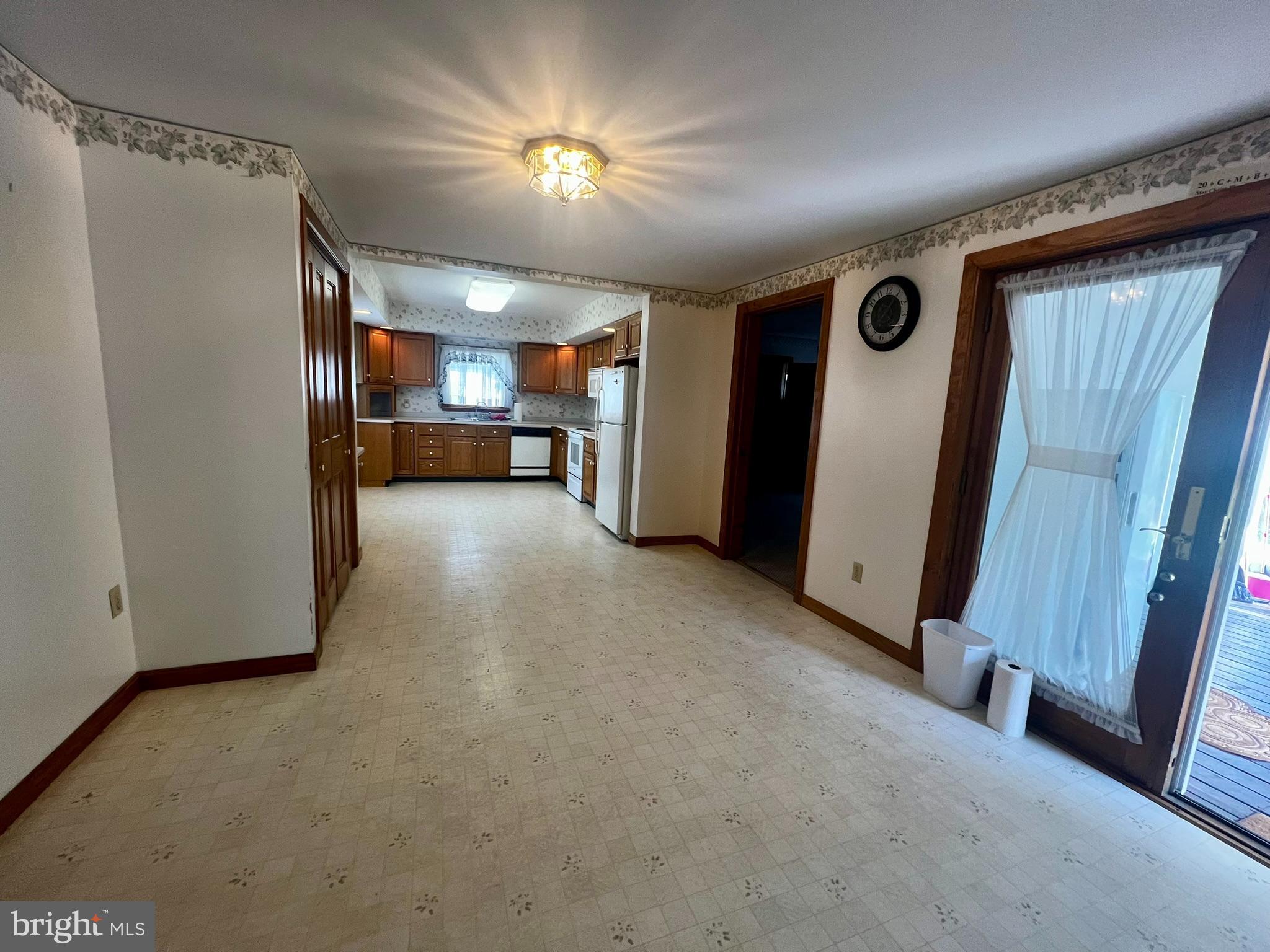 128 Main Street Lykens, PA 17048 - Photo 16 of 28 a view of a livingroom with a furniture and a ceiling fan