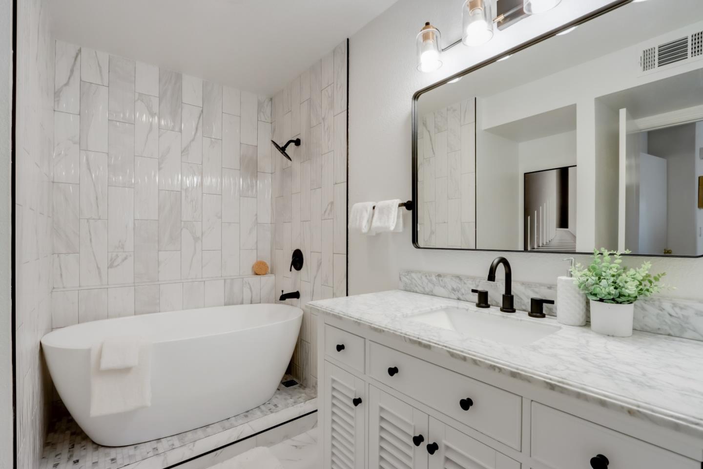 903 Springview Circle San Ramon, CA 94583 - Photo 17 of 41 a bathroom with a bathtub and a sink