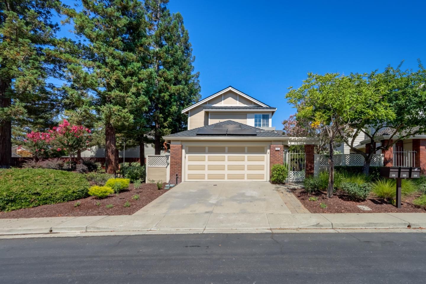 903 Springview Circle San Ramon, CA 94583 - Photo 25 of 41 a front view of a house with a yard and garage