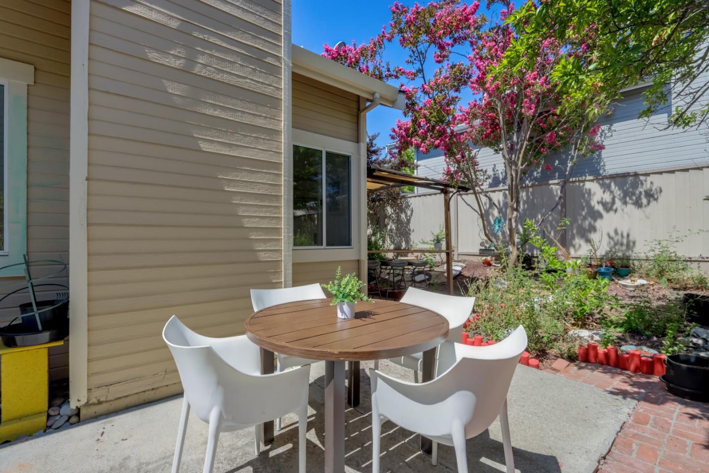 903 Springview Circle San Ramon, CA 94583 - Photo 28 of 41 a view of a patio with table and chairs and potted plants
