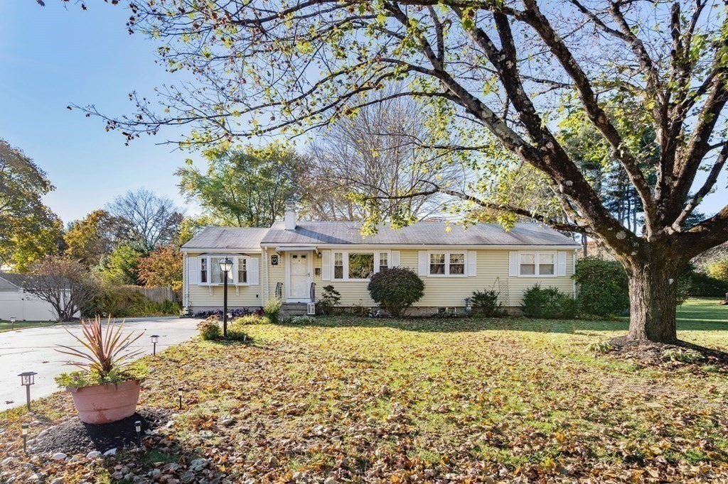 9 Wesson Road Ashland, MA 01721 - Photo 1 of 32 a house with trees in the background