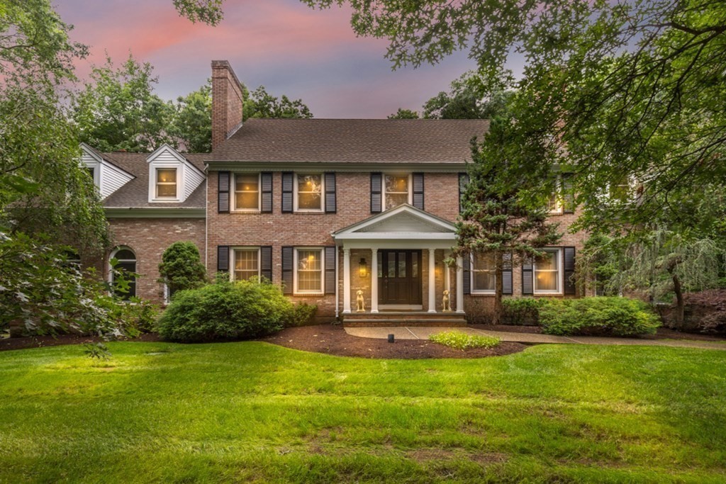 30 Castle Drive Sharon, MA 02067 - Photo 2 of 42 a front view of a house with a garden