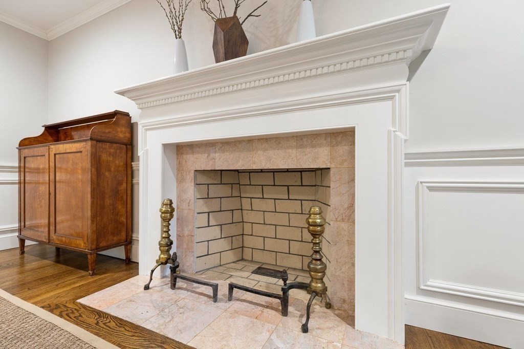 30 Castle Drive Sharon, MA 02067 - Photo 27 of 42 a living room with a fireplace