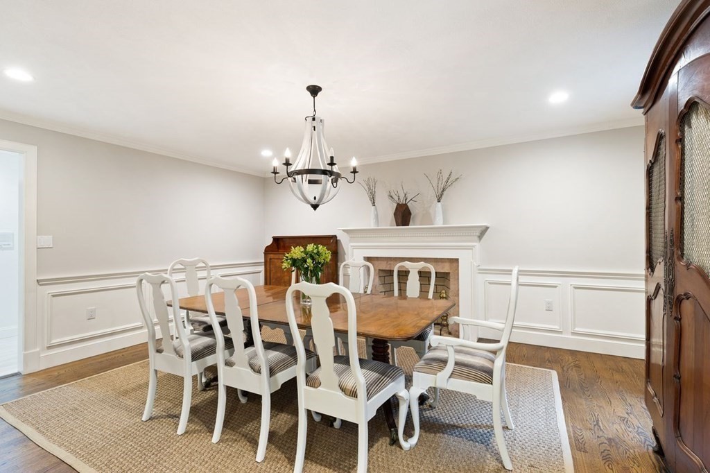 30 Castle Drive Sharon, MA 02067 - Photo 28 of 42 a view of a dining room with furniture wooden floor and chandelier