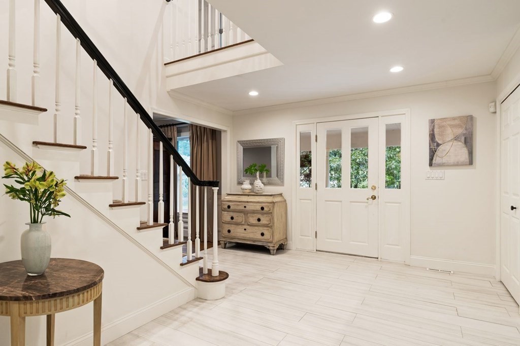 30 Castle Drive Sharon, MA 02067 - Photo 3 of 42 a view of entryway with livingroom and stairs