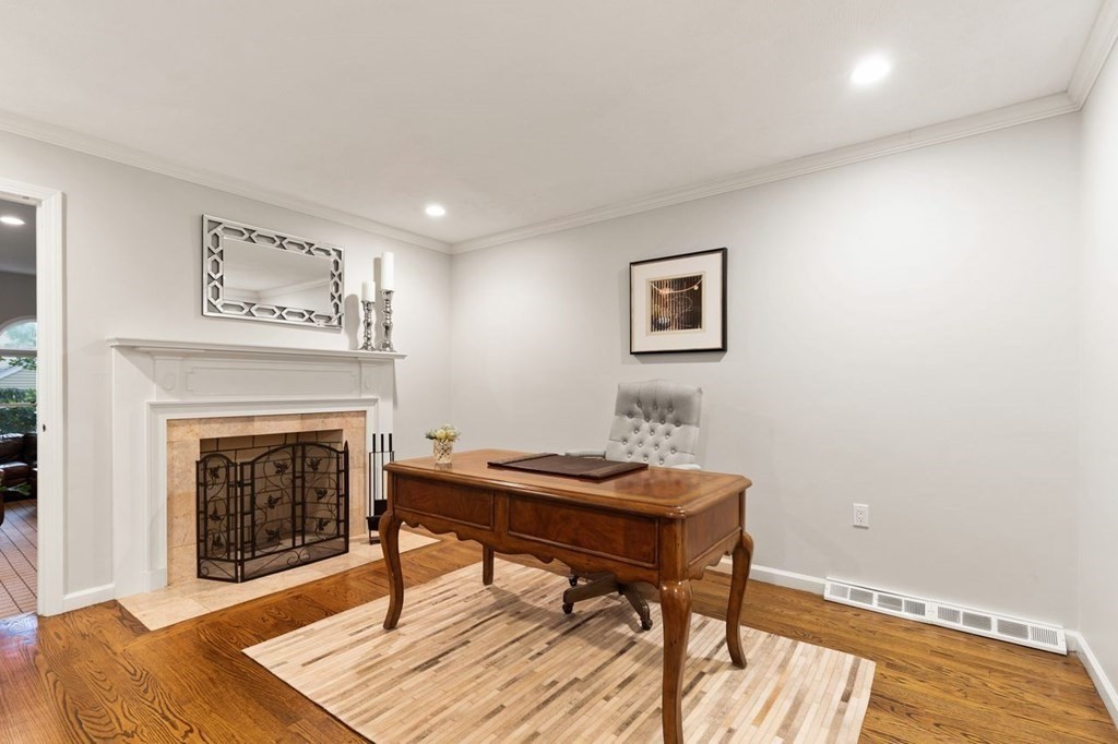 30 Castle Drive Sharon, MA 02067 - Photo 7 of 42 a workspace with furniture and a fireplace