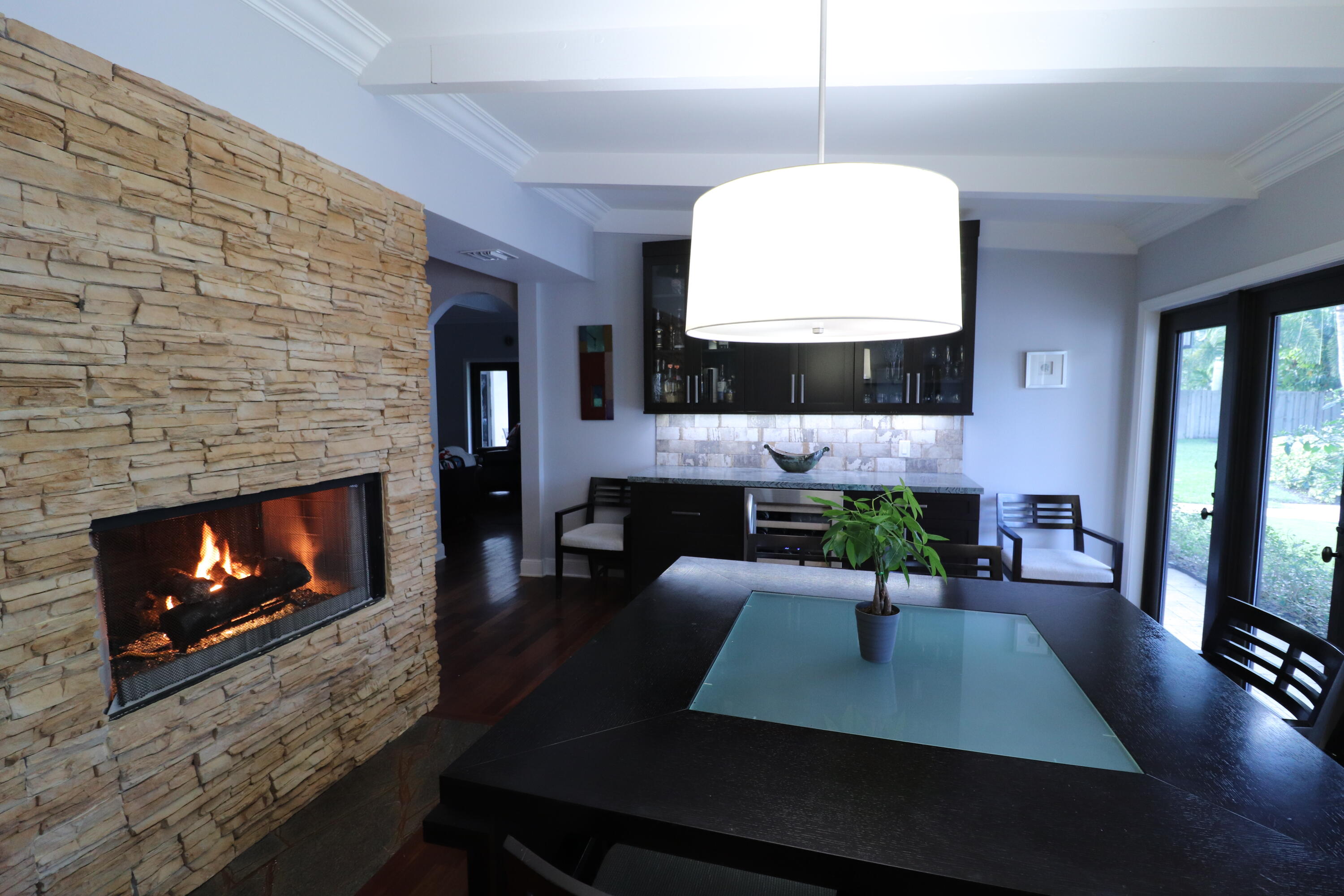 921 Southwest 20th Street Boca Raton, FL 33486 - Photo 14 of 56 a living room with furniture and a fireplace