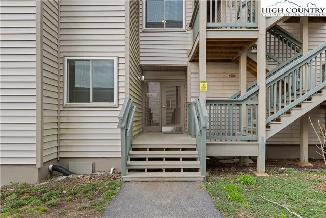 a front view of house with stairs