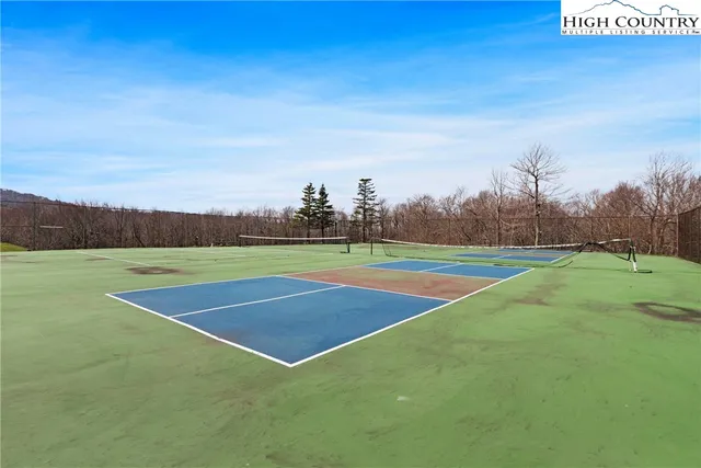 a room with stairs and a table