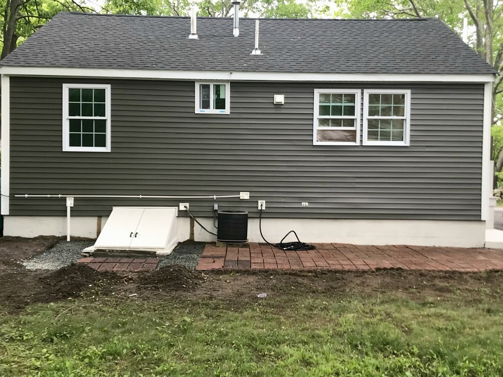 9 Colonial Road Milford, MA 01757 - Photo 15 of 16 a view of a house with a yard