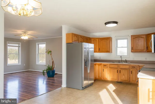 a view of storage and utility room with washer and dryer