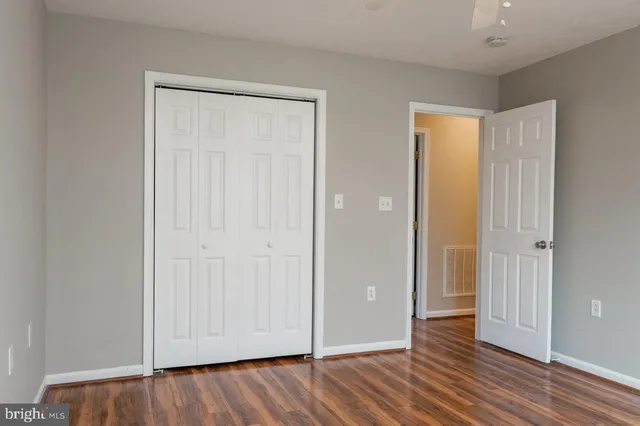a bathroom with a sink toilet and vanity