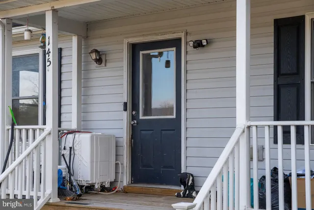 a view of front door and porch