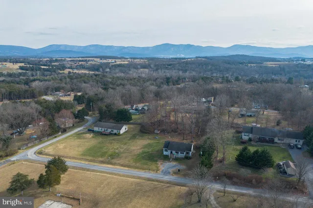 a view of a backyard with wooden floor