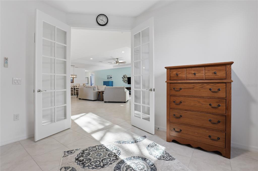 14879 Wichita Road Port Charlotte, FL 33981 - Photo 30 of 45 a view of walk in closet and bedroom