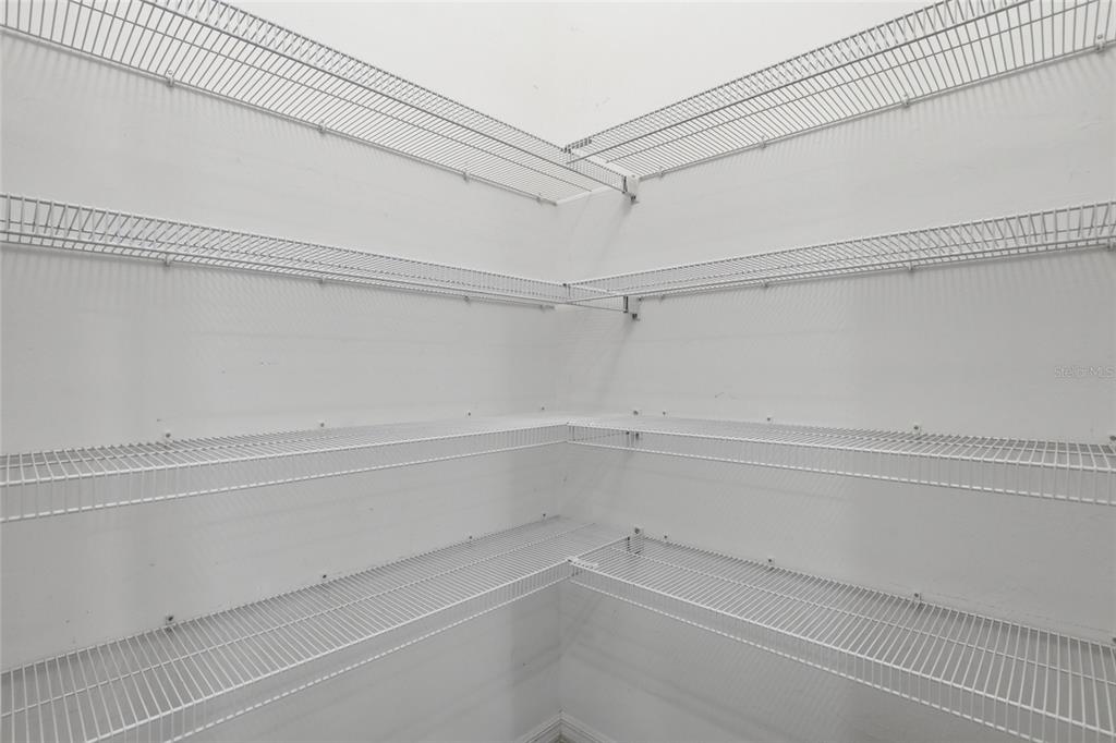 14879 Wichita Road Port Charlotte, FL 33981 - Photo 32 of 45 a view of a room with empty racks