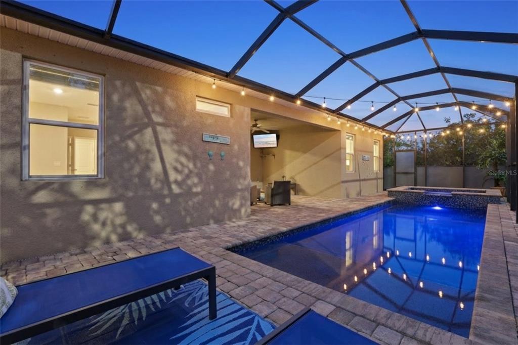 14879 Wichita Road Port Charlotte, FL 33981 - Photo 35 of 45 a view of a living room with a table and chairs