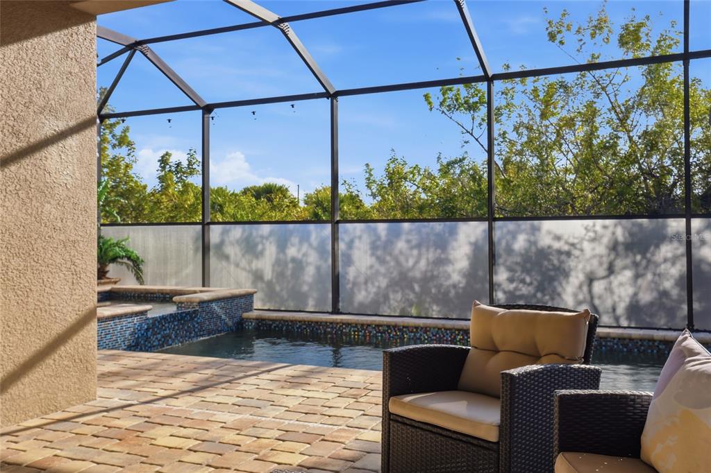 14879 Wichita Road Port Charlotte, FL 33981 - Photo 38 of 45 a view of sitting area with furniture and wooden floor