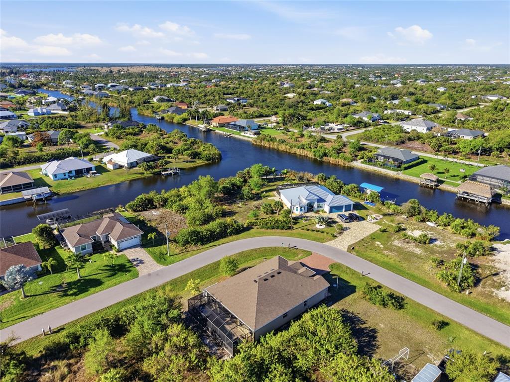 14879 Wichita Road Port Charlotte, FL 33981 - Photo 45 of 45 an aerial view of residential houses with outdoor space